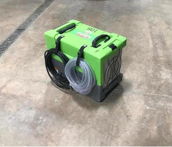 a picture of a SERVPRO green dehumidifier 